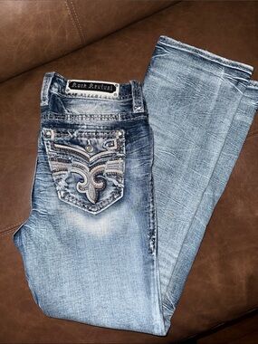 Like new Rock Revival size 29 Tama Mid rise Boot distressed jeans